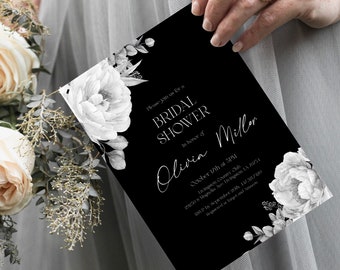 May include: A black bridal shower invitation with white floral accents and text. The invitation reads "Please join us for a BRIDAL SHOWER in honor of Olivia Miller." The date and location are also included.
