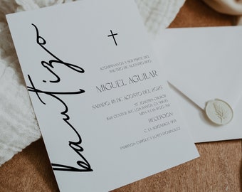 May include: A white invitation card with black calligraphy that says "bautizo" and a cross at the top. The text on the card reads "Acompañanos a ser parte del bautizo de nuestro hijo Miguel Aguilar Sabado 18 de Agosto del 2025 St. Josephs Church 1621 Center Ave, Los Banos, CA 93635 Misa a las 1:00 PM Recepcion C. La Michoacana 951 Padrinos Enrique y Lupita Dominguez"