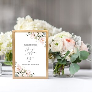 Puede incluir: Un marco dorado con fondo blanco y un dise&ntilde;o floral. El texto "FULLY EDITABLE Custom Sign CREATE & PRINT MULTIPLE SIGNS" est&aacute; impreso en el cartel.