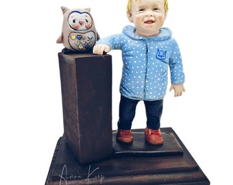 Polymer clay child portrait made from foto