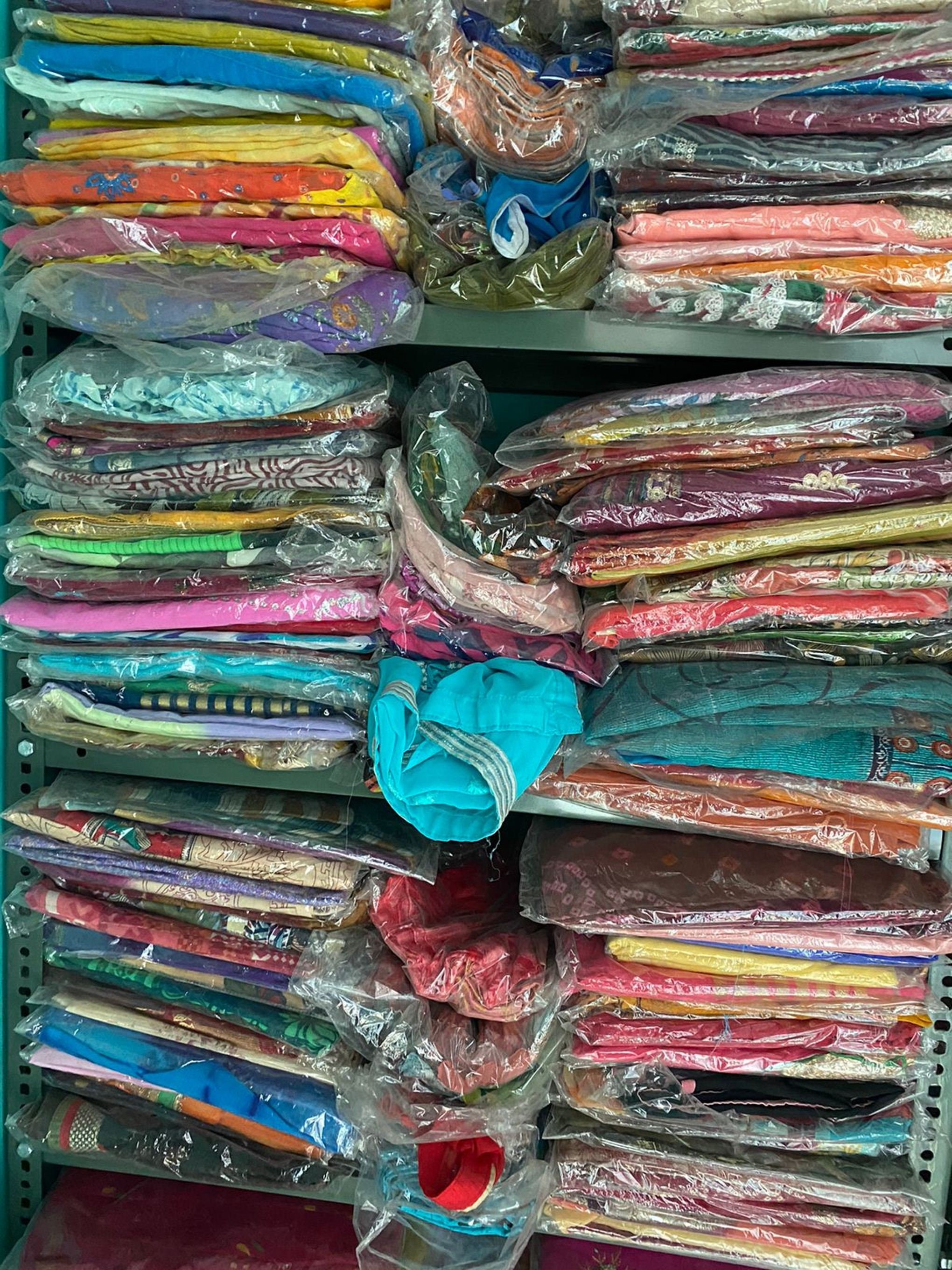Meet Mini, our vintage sari supplier