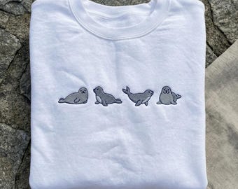 Embroidered Seal Sweatshirt, Cute Seal Evolution Hoodie, Marine Animal Lover Gift, Minimalist Ocean Crewneck, Kawaii Sea Lion Embroidery