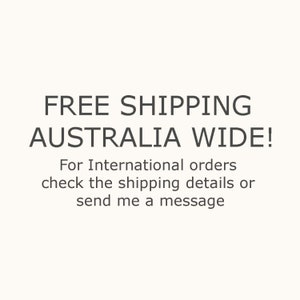 May include: Text on a cream-colored background reads "FREE SHIPPING AUSTRALIA WIDE!" followed by "For International orders check the shipping details or send me a message."