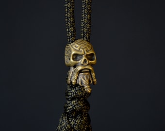Llavero con cuentas de paracord de bronce, abalorios para cuchillos, abalorios y dijes - Calavera de Odín