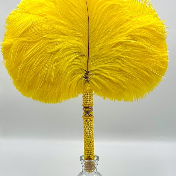 Yellow hand fan