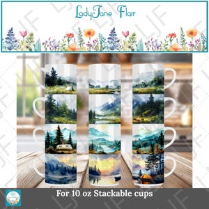 May include: Stack of white ceramic mugs with wraparound landscape designs. Each mug features a different watercolor scene of mountains, forests, and lakes. The mugs are labeled "For 10 oz Stackable cups" and the top of the image has the text "LadyJane Flair".