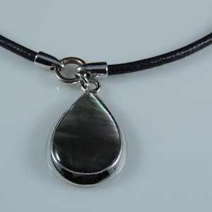 16&quot; Lia Sophia Leather Necklace with Silver Tone Pendent With Grayish Center Stone.  Marked