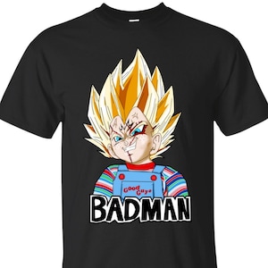 Könnte beinhalten: Schwarzes T-Shirt mit einem Cartoon-Bild eines gelbhaarigen Charakters, der ein rot-blau gestreiftes Hemd mit dem Text "Good Guys" und "BADMAN" trägt.