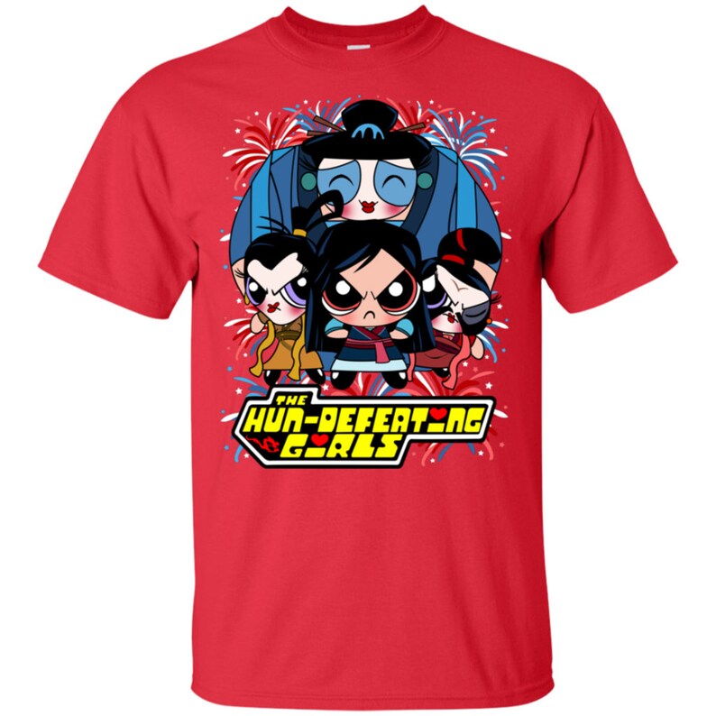 May include: Red t-shirt with a graphic of the Powerpuff Girls in their superhero outfits. The text "The Hun-Defeating Girls" is printed in yellow with red hearts. The background is a red, white, and blue fireworks design.