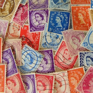 May include: A collection of vintage postage stamps featuring a variety of designs, including portraits of a queen, floral patterns, and geometric shapes. The stamps are in various colours, including red, blue, green, and purple.
