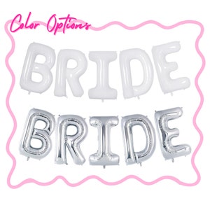 May include: Two sets of foil balloons spelling "BRIDE". The top row is white, the bottom row is silver. The text "Color Options" is in pink script at the top. Ideal for a bridal shower or wedding celebration.