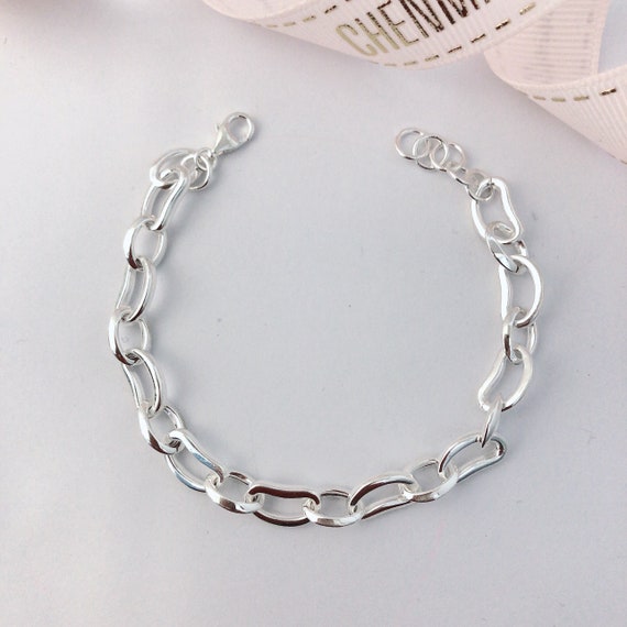 Buy Silver Plated Statement Bangle - Single Pc by Noor Online at Aza  Fashions.