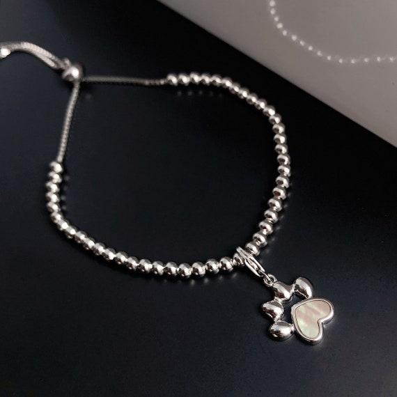 Bracciale Zampa Di Cane In Perle Naturali Di Bodhi - Elastico, Portafortuna Per Amanti Animali, Regalo Uomo/Donna