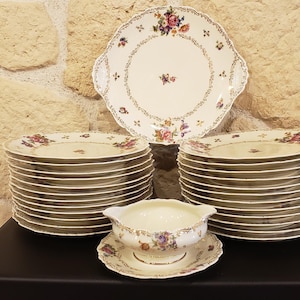 Service fleuri porcelaine de Limoges