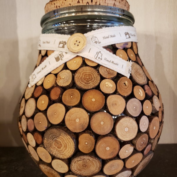 Old jar transformed into a wooden candy box