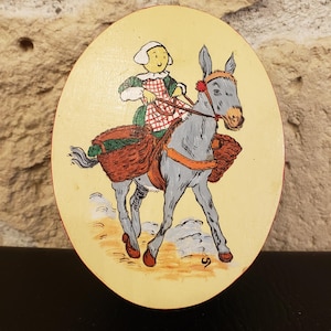 Vintage wooden box with colorful illustration