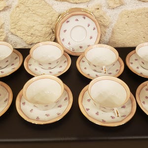Set of 8 Limoges porcelain cups and 12 saucers
