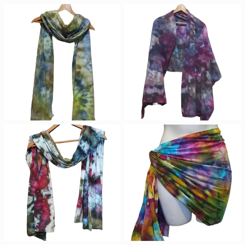 K&ouml;nnte beinhalten: Vier Batik-Schals in verschiedenen Farbkombinationen. Die Schals sind aus einem weichen, flie&szlig;enden Stoff gefertigt und perfekt, um jedem Outfit einen Hauch von Farbe und Stil zu verleihen.