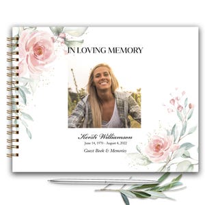 May include: A white guest book with a floral design and a photo of a woman. The text "In Loving Memory" is at the top of the page. The text "Kersti Williamson June 14, 1970 - August 4, 2022 Guest Book & Memories" is at the bottom of the page.