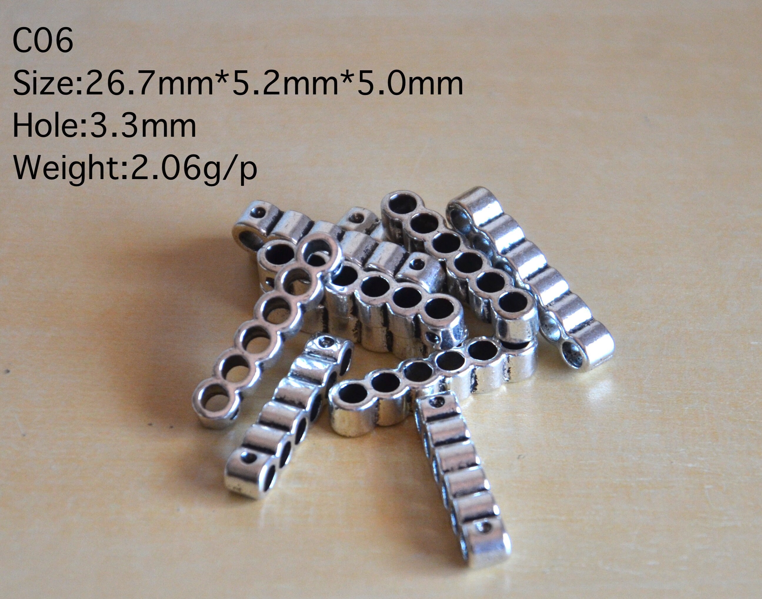 a set of 30g sixfold holes beads,connector beads, alloy double holes beads, letaher cord beads, silver color cylindrical beads,six holes
