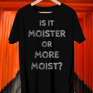 Is it moister or more moist? Short-Sleeve Unisex T-Shirt