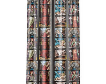May include: A curtain with a repeating pattern of stained glass windows depicting the nativity scene. The windows are framed in black and feature a blue, red, and yellow color scheme.