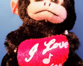 Vintage musical 1990s I Love You Monkey plush toy