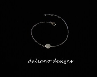CZ Pave Chain Bracelet Round Shape 8mm. Adjustable length 6.5 to 7.5. 925 Sterling Silver w/ Rhodium Plating to prevent tarnish.