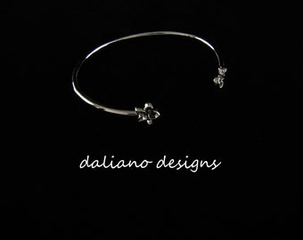 Plumeria (8mm flowers) Skinny Cuff. Hawaiian & Island inspired jewelry designs. 925 Sterling Silver w/ Rhodium plating to prevent tarnish.
