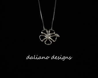 Hibiscus Pendant w/ Chain.  Hawaiian & Island inspired jewelry designs.  925 Sterling Silver w/ Rhodium Plating to prevent tarnish.