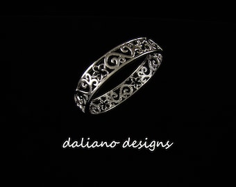 Plumeria Scroll Bangle 10mmW. Hawaiian & Island inspired jewelry designs. 925 Sterling Silver w/ Rhodium plating to prevent tarnish.