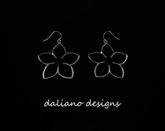 Plumeria Oversized Hook Earrings. Hawaiian & Island inspired jewelry designs. 925 Sterling Silver w/ Rhodium plating to prevent tarnish.