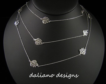 Monstera Leaf 60"Length Necklace (12mmW Leaves). Hawaiian inspired design. 925 Sterling Silver w/ Rhodium plating to prevent tarnish.