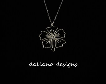 Hibiscus Wire Style Pendant w/ Chain. Hawaiian inspired jewelry design. 925 Sterling Silver w/ Rhodium plating to prevent tarnish.