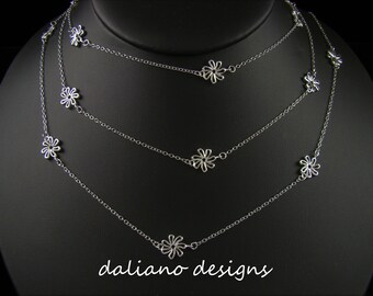Tiare 60"Length Necklace (10mm flowers). Hawaiian inspired jewelry design. 925 Sterling Silver w/ Rhodium plating to prevent tarnish.