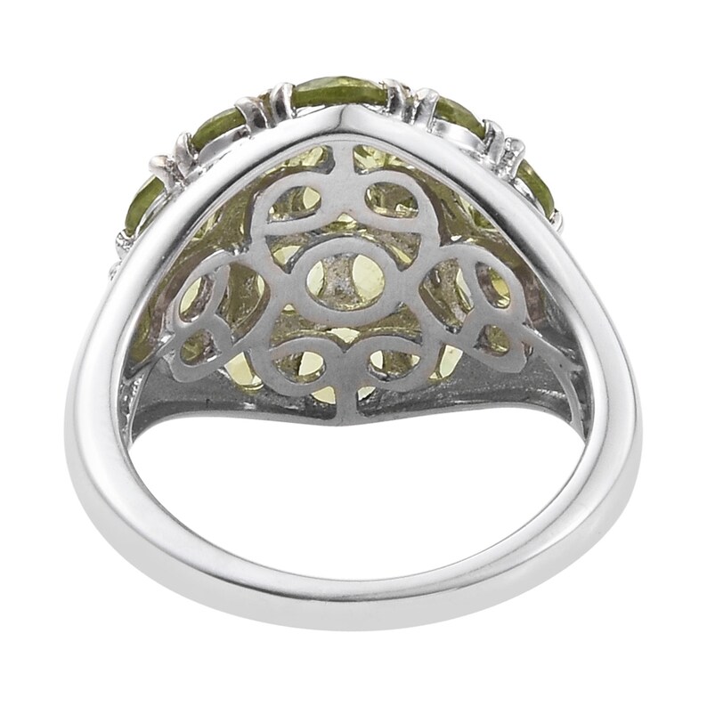 Silver Sterling Green Olivine Ring Holding Peridot Gems And Finished With Rhodium.