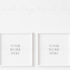 May include: Three white picture frames with white mats, each with the text "YOUR WORK HERE" inside. The frames are hanging on a white wall.