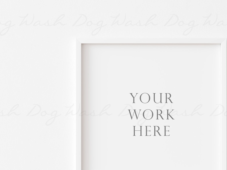 May include: A white picture frame with the text "YOUR WORK HERE" in a serif font. The frame is set against a white background. The image is a mockup for displaying artwork or photography.