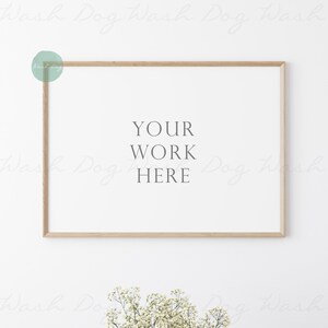 May include: A light wood frame with a white mat and a white background. The text "YOUR WORK HERE" is printed in the center of the frame.