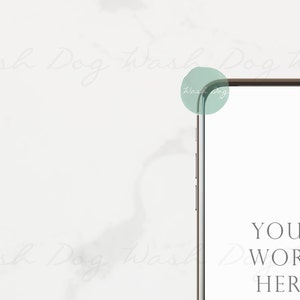 May include: A gold smartphone mockup with a white screen displaying the text "YOUR WORK HERE". The phone is on a white marble background.