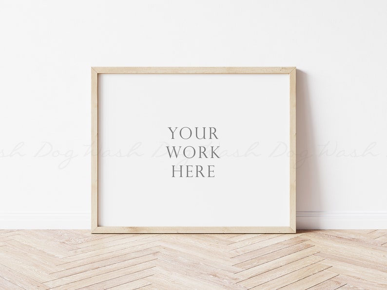 May include: A light wood frame with a white background and the text "YOUR WORK HERE" in the center.