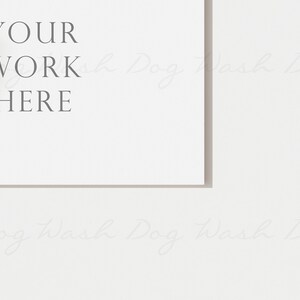 Puede incluir: Una tarjeta blanca con el texto "YOUR WORK HERE" impreso en gris.