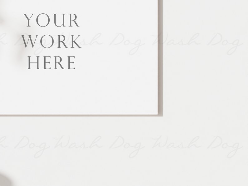 Puede incluir: Una tarjeta blanca con el texto "YOUR WORK HERE" impreso en gris.