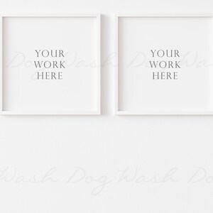 May include: Two white picture frames with white mats hanging on a white wall. The frames are square and have the text "YOUR WORK HERE" in the center of each frame.