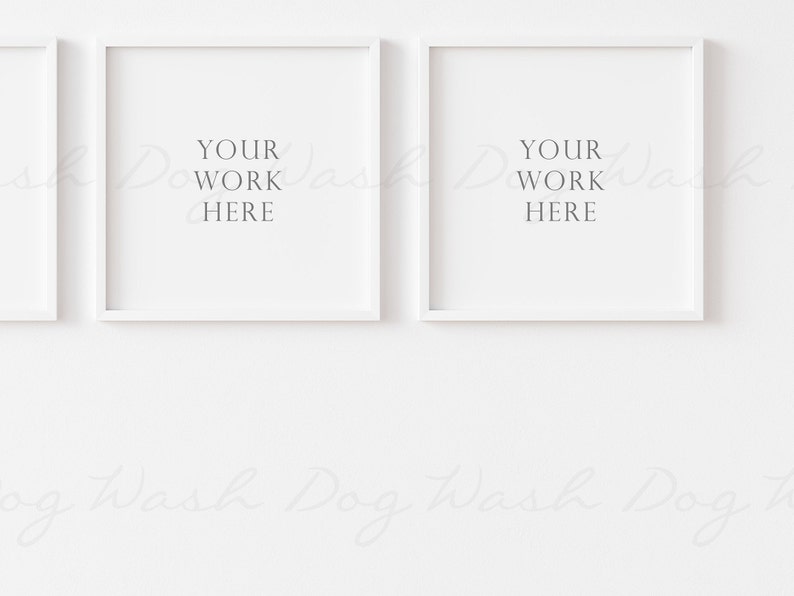 May include: Two white picture frames with white mats hanging on a white wall. The frames are square and have the text "YOUR WORK HERE" in the center of each frame.