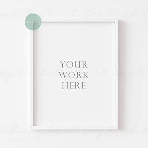 Puede incluir: Marco de imagen blanco con un passe-partout blanco y un fondo blanco. El texto "YOUR WORK HERE" está impreso en el centro del passe-partout.