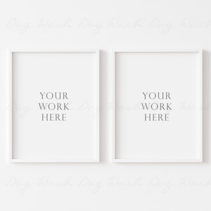 Op de afbeelding: Twee witte fotolijsten tegen een witte achtergrond. De lijsten zijn leeg en hebben de tekst "YOUR WORK HERE" in elk lijst.