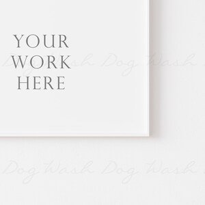 May include: A white frame with a white background and the text "YOUR WORK HERE" in the center.