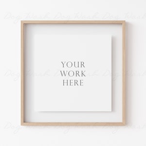 May include: A square wooden frame with a white mat and a white background. The text "YOUR WORK HERE" is printed in the center of the mat.