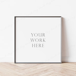 Könnte beinhalten: Ein quadratischer Bilderrahmen mit schwarzem Rahmen und weißem Hintergrund. Der Text "YOUR WORK HERE" ist in der Mitte gedruckt.